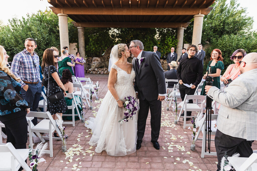 mature bride wearing neck traditional wedding dress at outdoor wedding in gilbert arizona from strut bridal salon