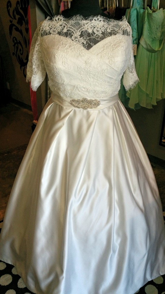 satin ballgown with lace cover up
