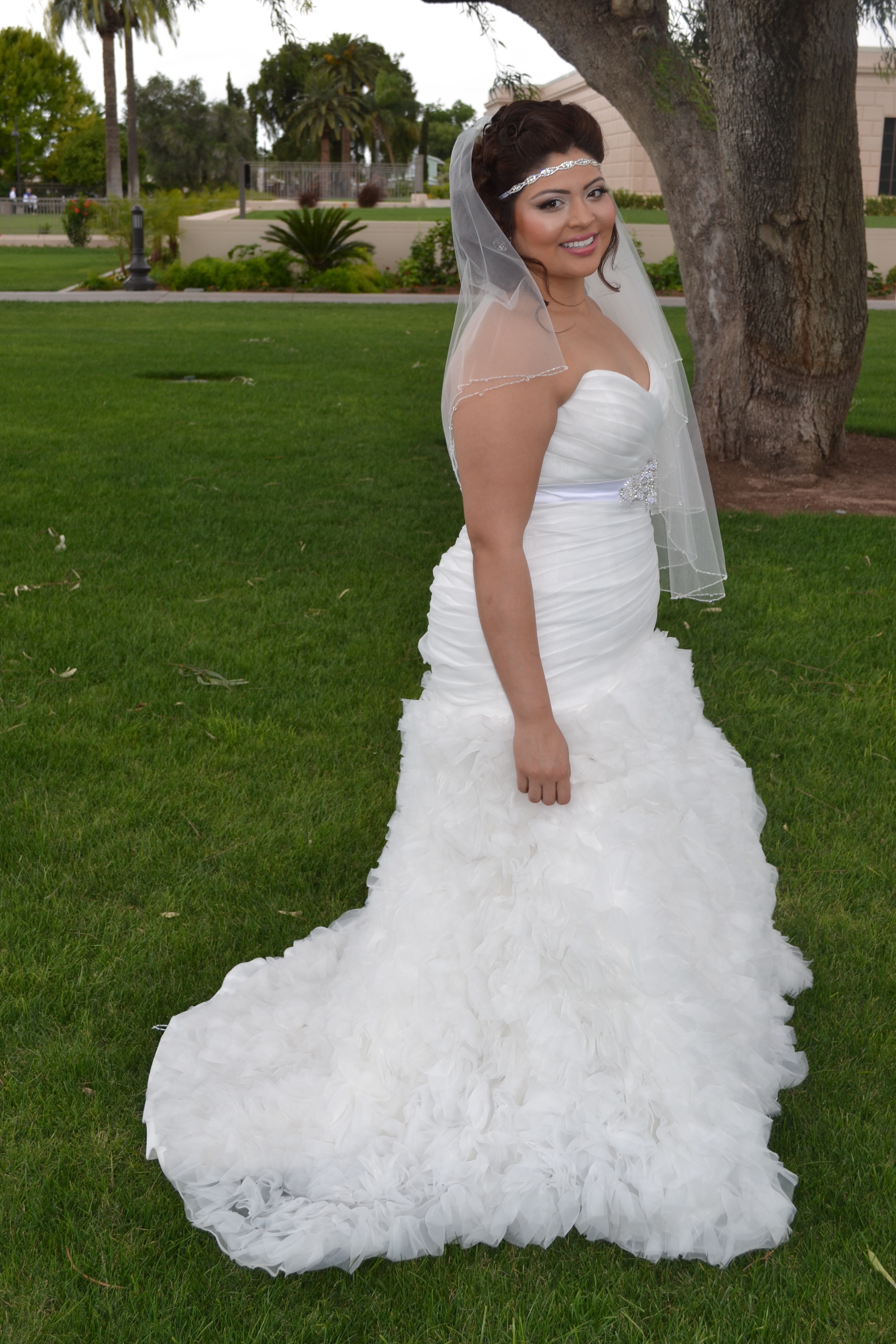 Nicoleh's Fitted Ruffled Wedding Gown - Strut Bridal Salon