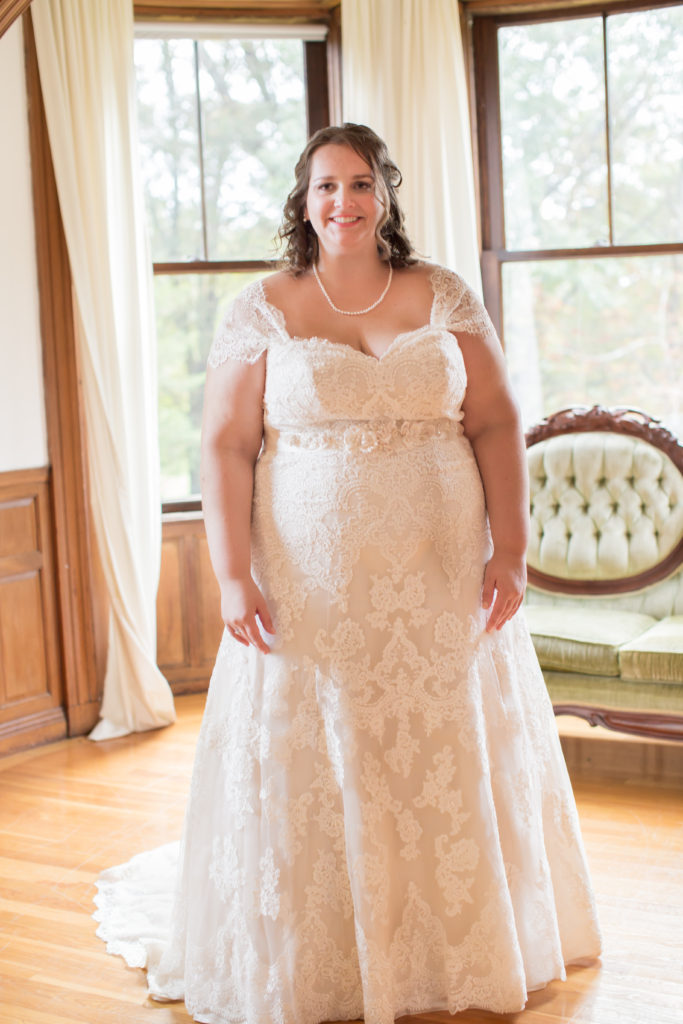 Wedding dress with buttons hot sale all the way down