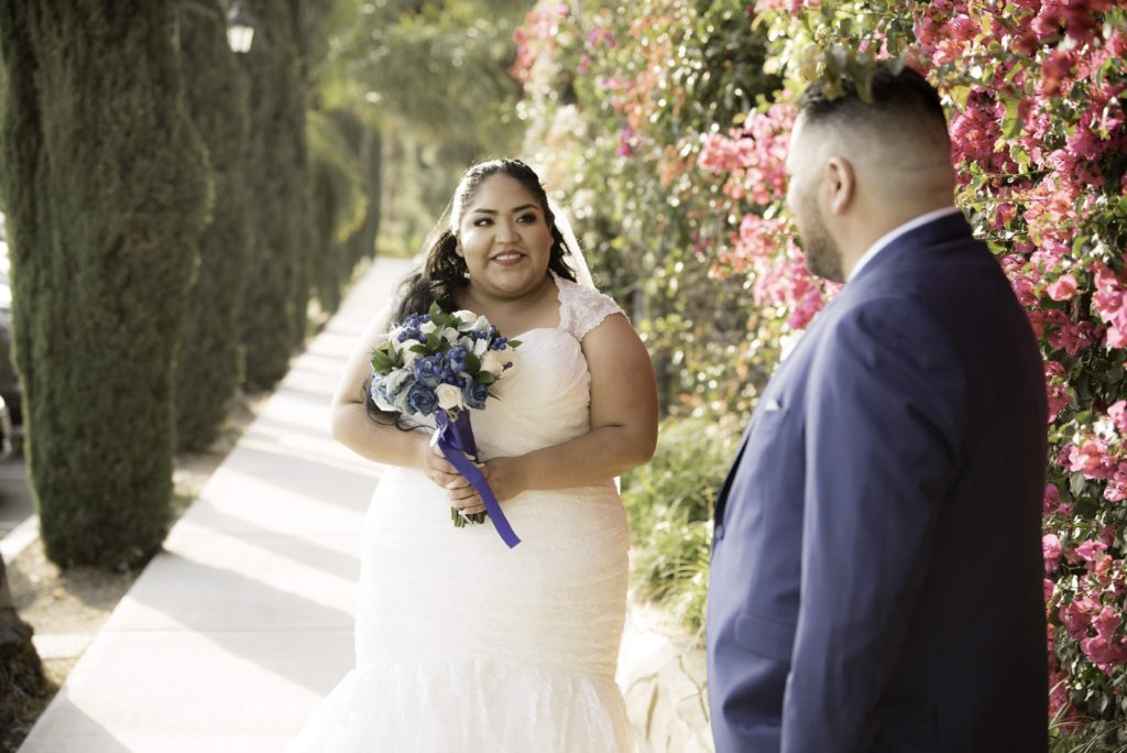 first look on wedding day with real plus size bride