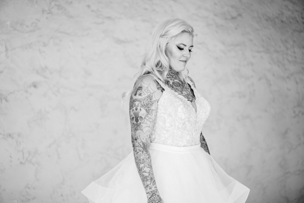 Plus size bride with tattoos