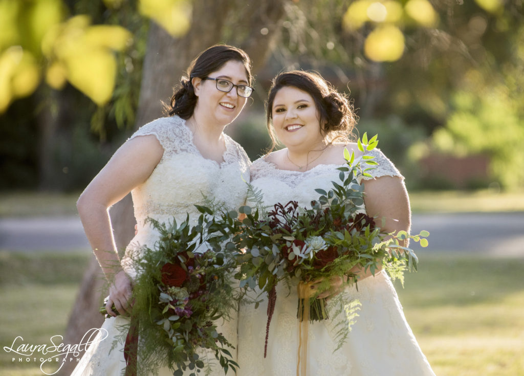 plus size bride with off the shoulder wedding dress