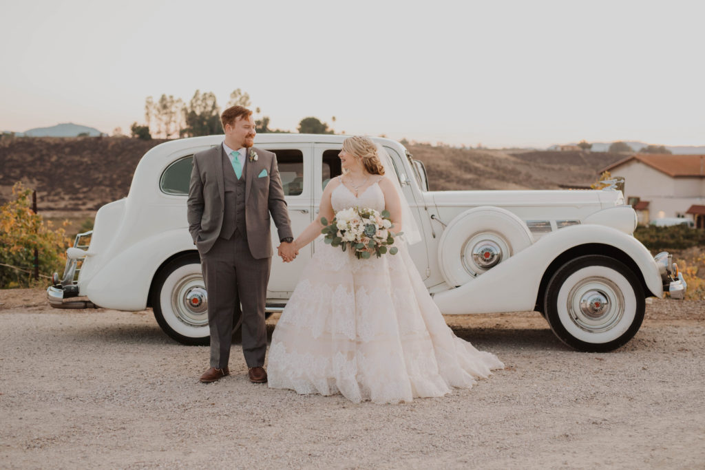 vintage car rental newlyweds plus size wedding dress