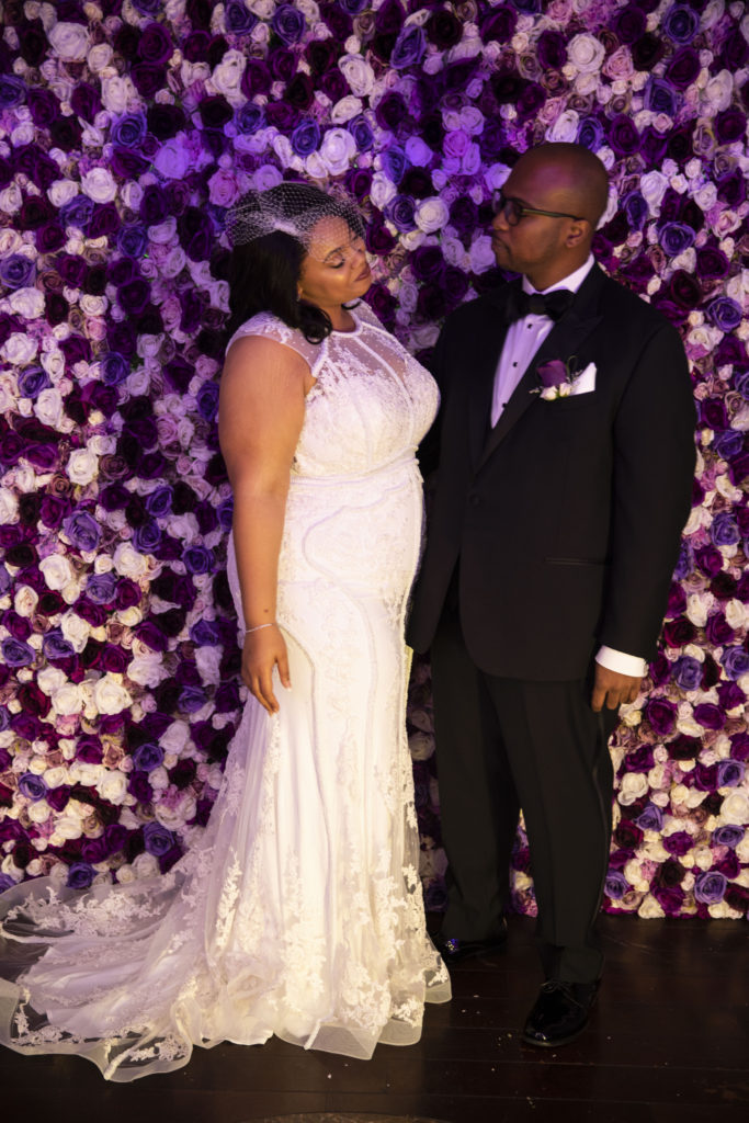 plus size bride wearing a sexy beaded fitted wedding gown