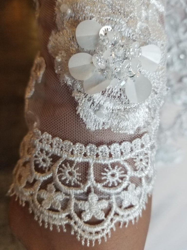 lace and beaded long sleeve wedding dress