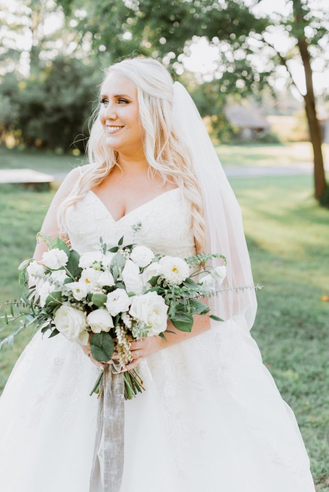 plus size bride in modern princess ballgown wedding dress