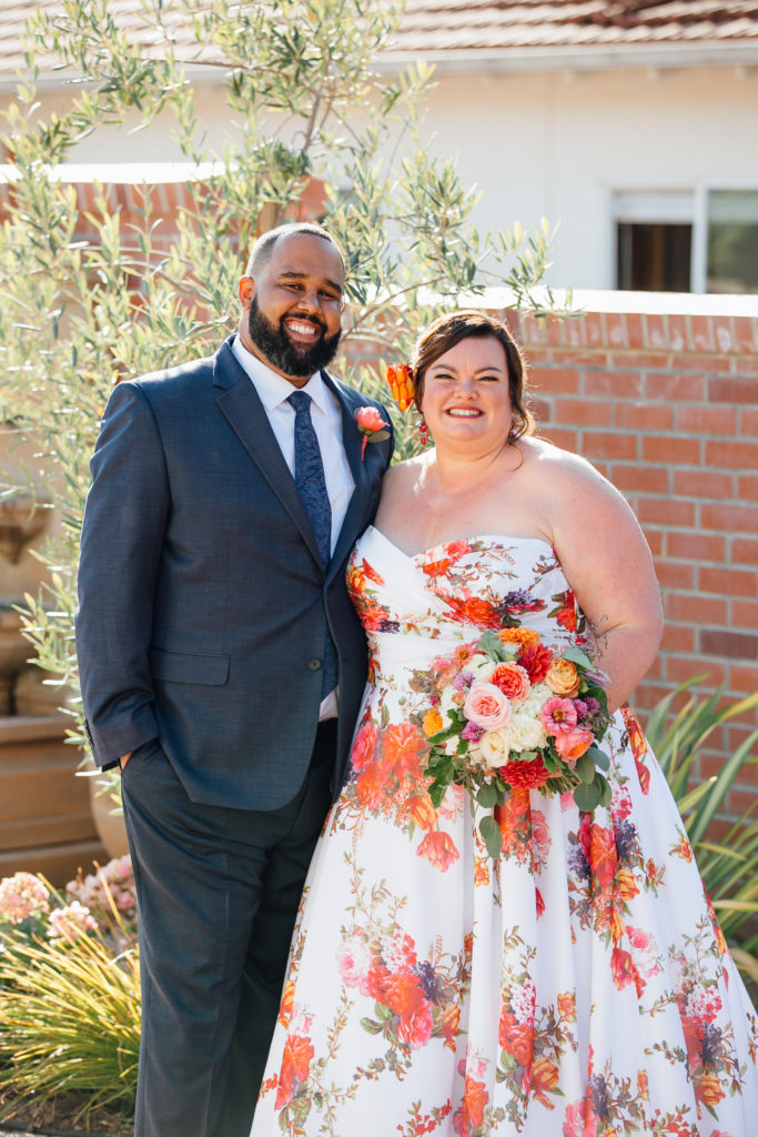 newlyweds real bride wearing floral wedding dress