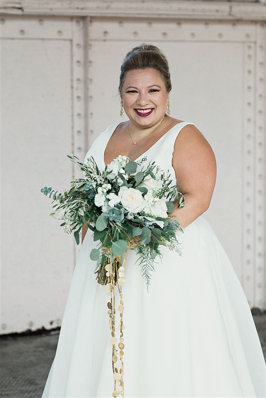 Classic vneck aline wedding dress with modern basket weave textured organza fabric and deep plunge bodice. 