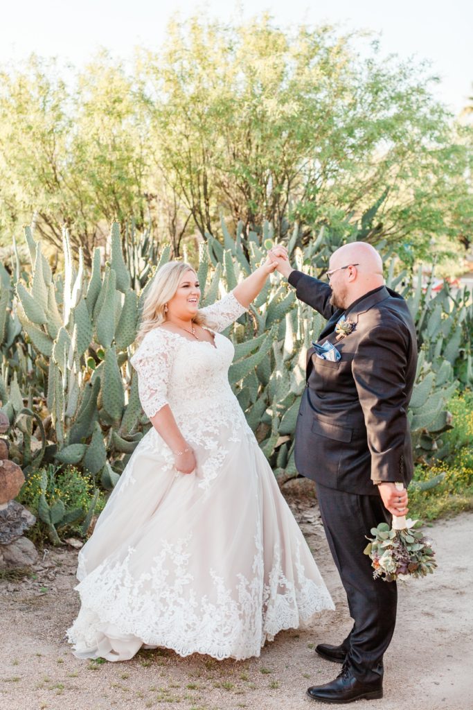 bride twirling in plus size wedding dress in Arizona