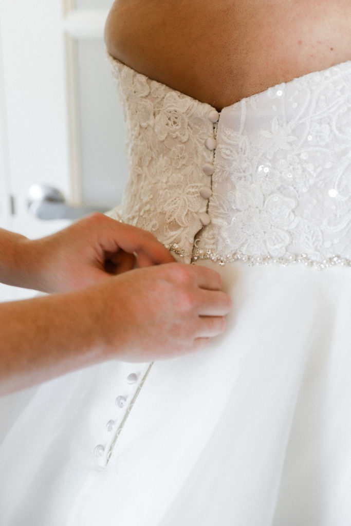 buttons-over-zipper-on-wedding-dress