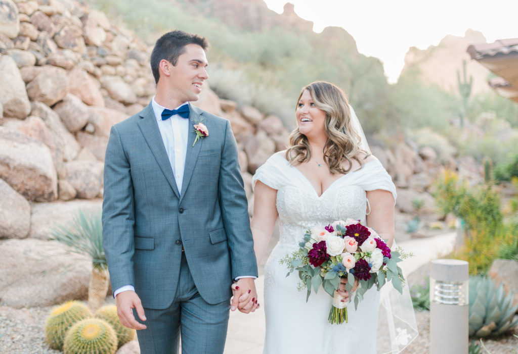 bride-and-groom-walking-around-camelback-inn-arizona