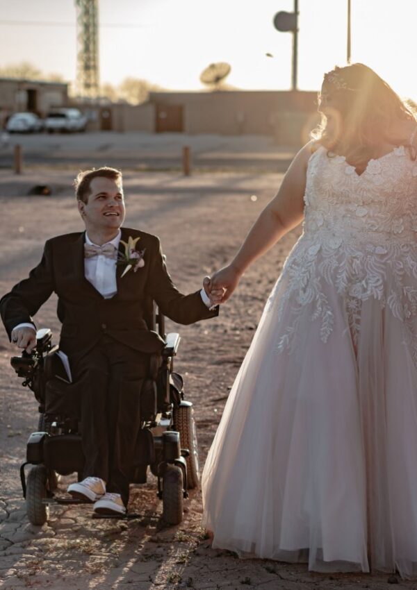 bride and groom in wheelchair