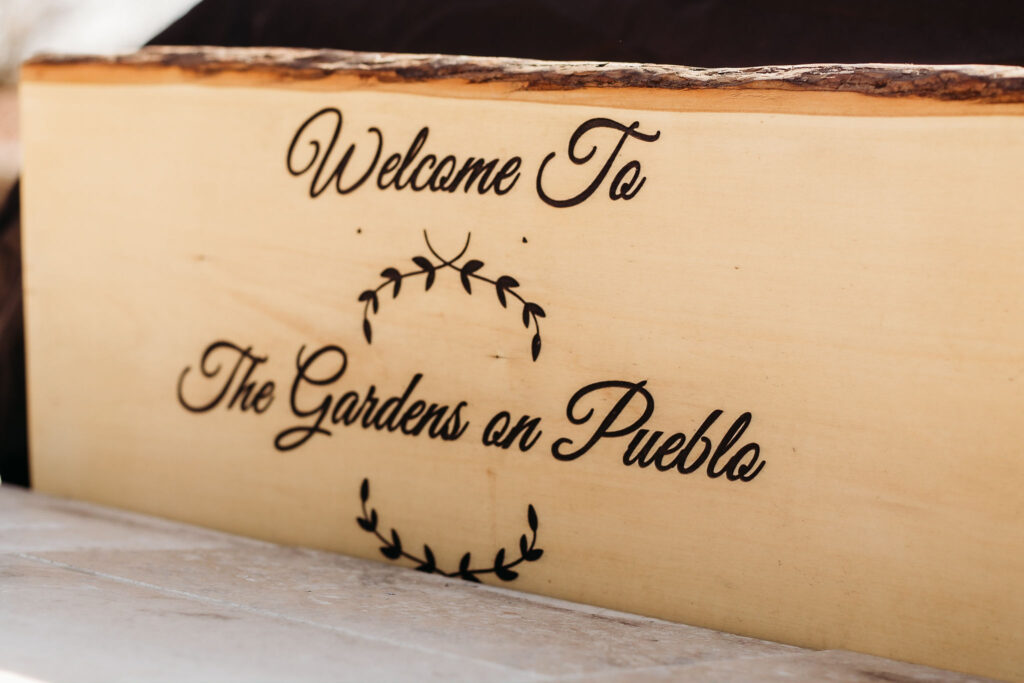 gardens on publo wedding venue sign