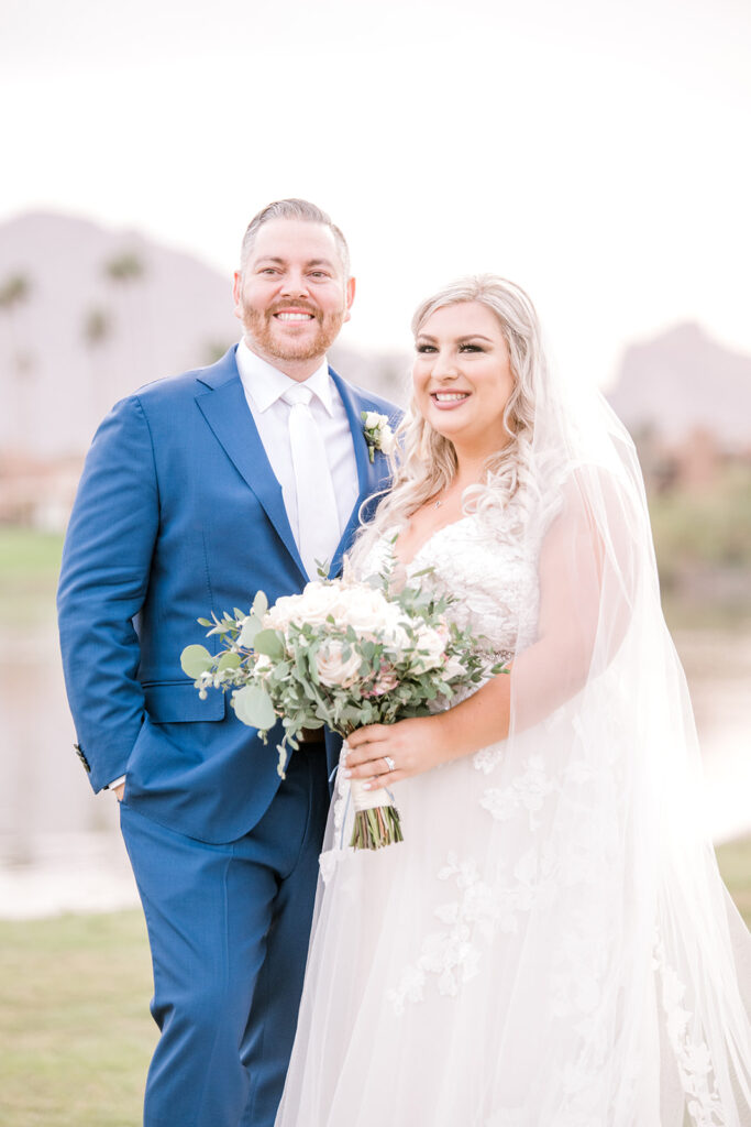 bride and groom smiling