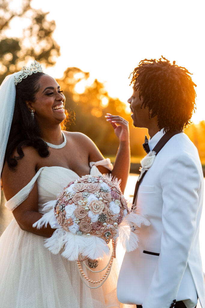 bride holding broach bouquet