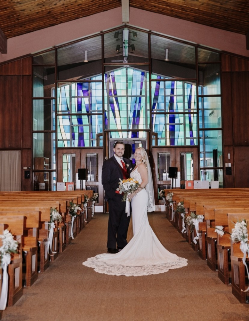 sexy crepe wedding dress with lace cutout train in church