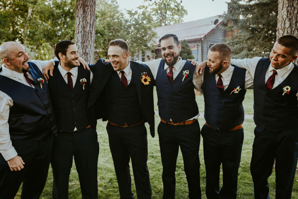 groomsmen wearing vests