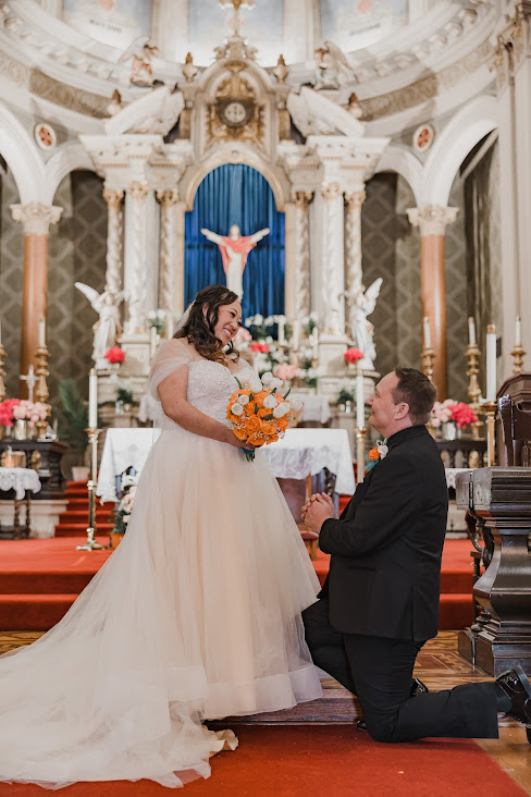 bride and groom in traditional catholic church in san jose california