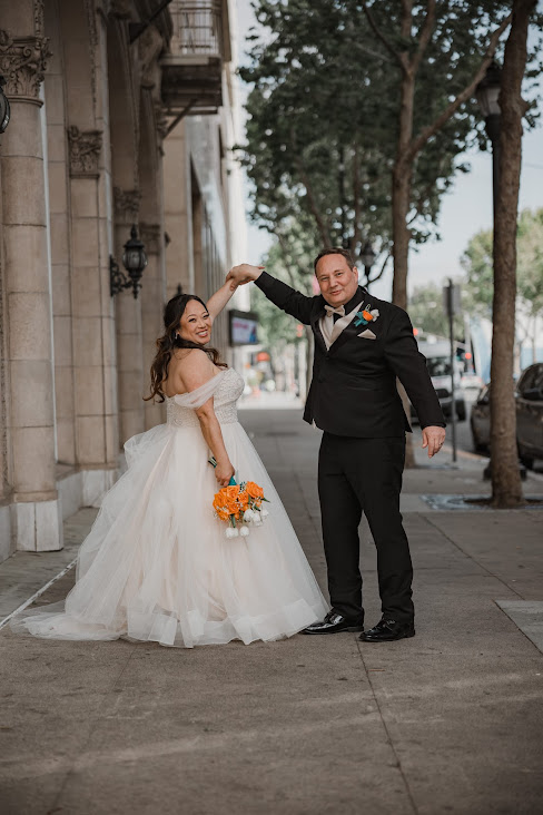 bride over 40 and groom in urban setting