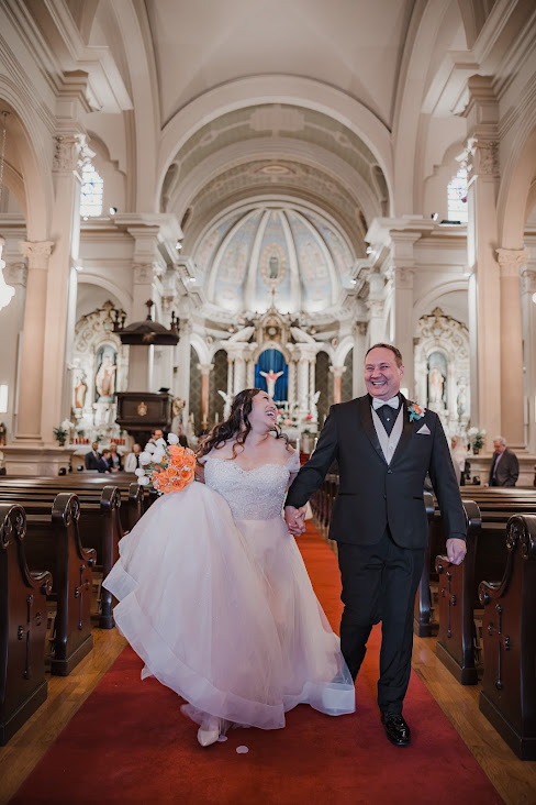 petite bride and groom in traditional catholic church in san jose california