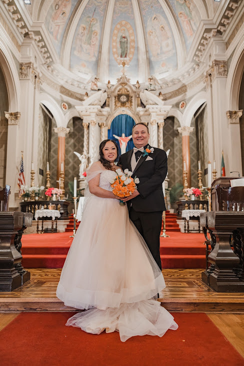 bride and groom in traditional catholic church in san jose california