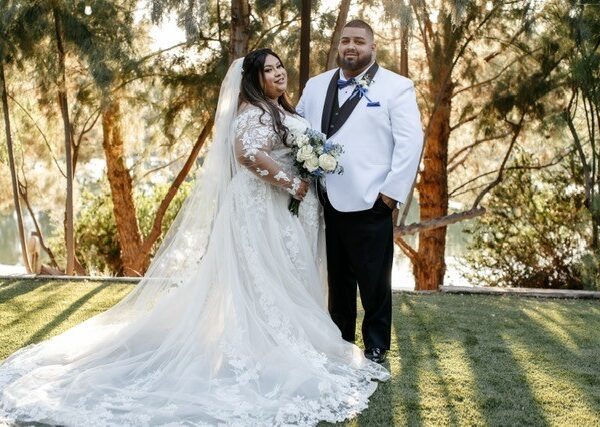 plus size bride in long sleeve ballgown wedding dress phoenix arizona