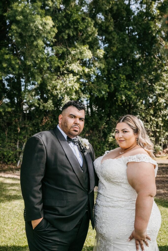 plus size bride and groom bridal portrait outdoors