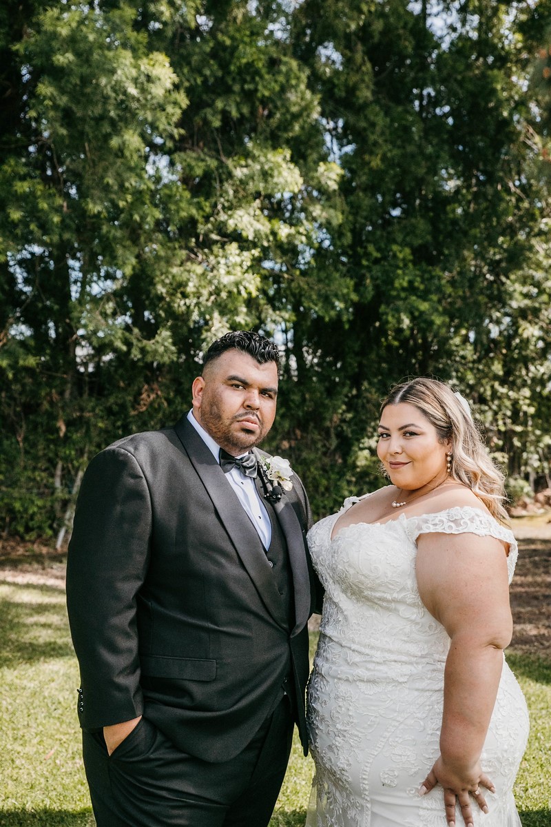 https://strutbridalsalon.com/wp-content/uploads/2023/03/real-plus-size-bride-and-groom.jpg
