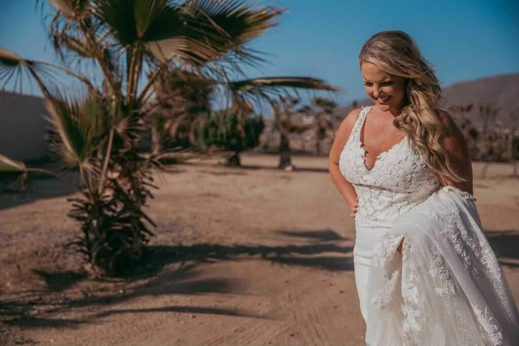 bride wearing sexy beach wedding dress in crepe