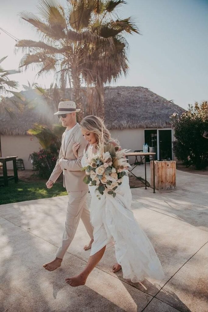 bride wearing sexy beach wedding dress in crepe