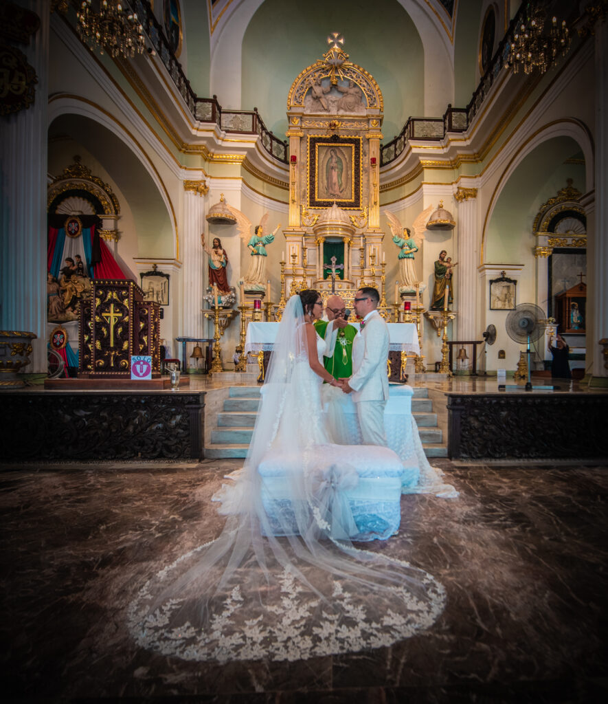 bride and groom inside old world church in puerto vallarta mexico