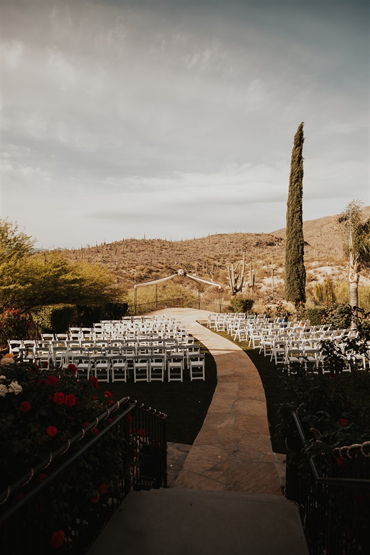 outdoor desert wedding ceremony with chairs