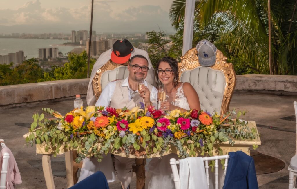 bride and groom at sweetheart table