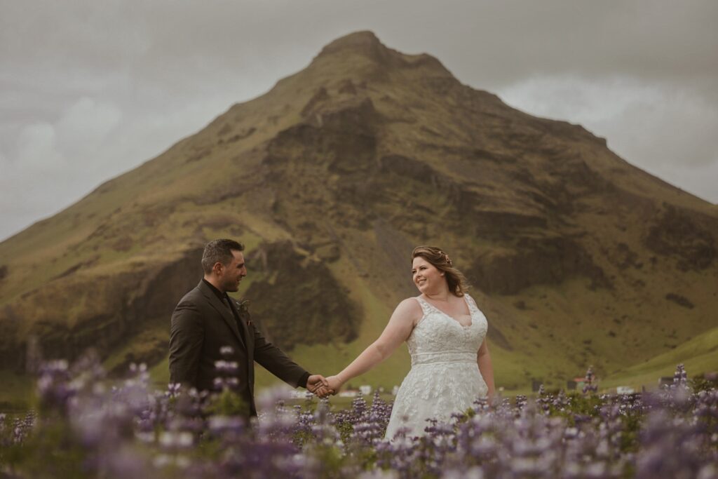 bride and groom at mountain in iceland