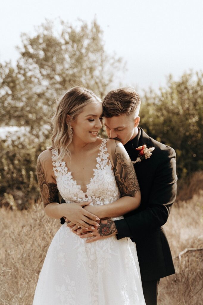 bride and groom with tattoos long beach california