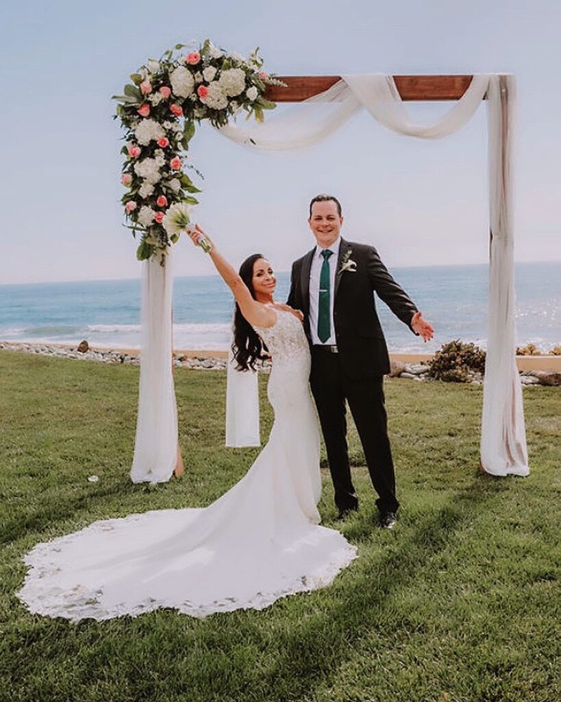 bride and groom crepe sexy lace wedding dress long beach california bridal shop