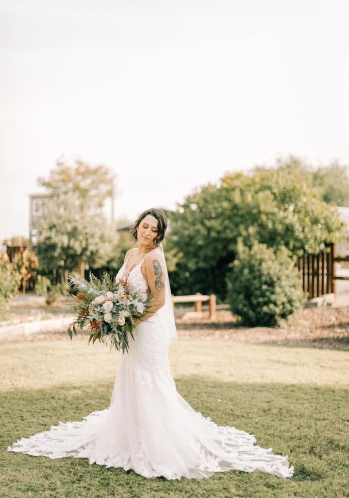 bride wearing sexy lace fitted mermaid wedding dress los angeles california