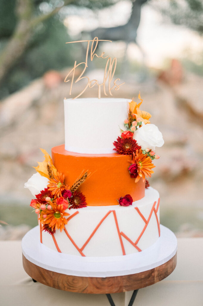 unique orange wedding cake table