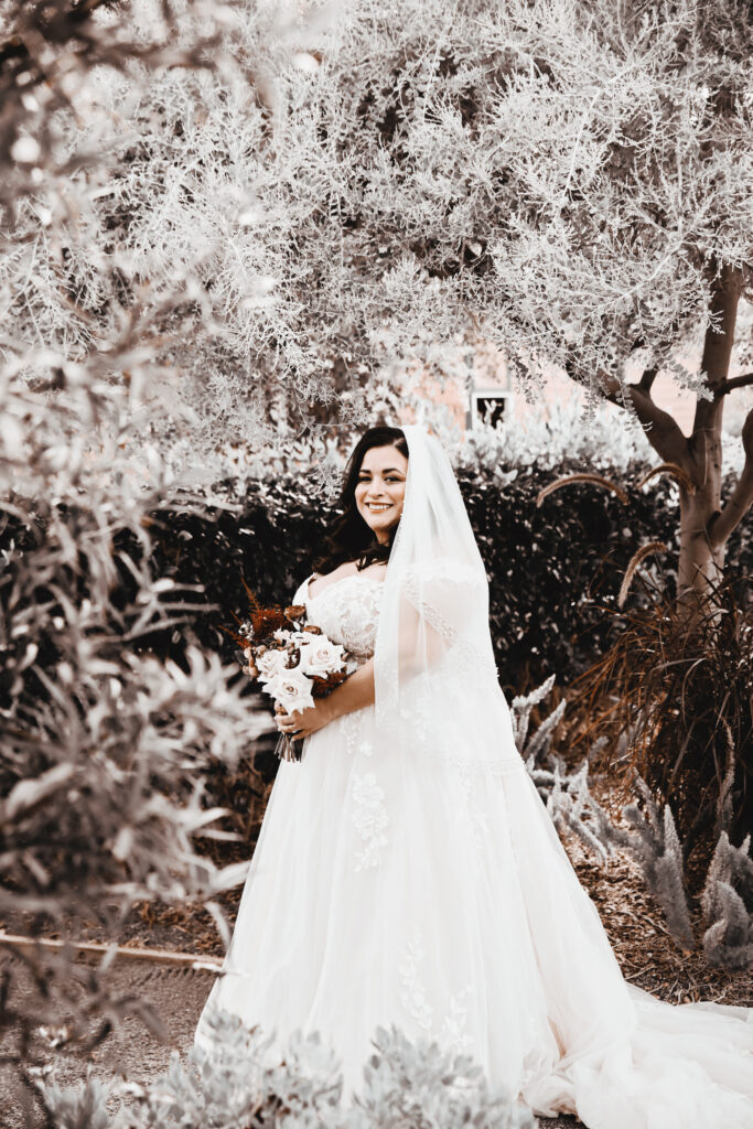 plus size bride wearing off the shoulder aline wedding dress angeles california