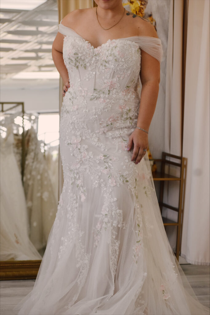 plus size colorful mermaid wedding dress with pink and green in chandler arizona bridal shop