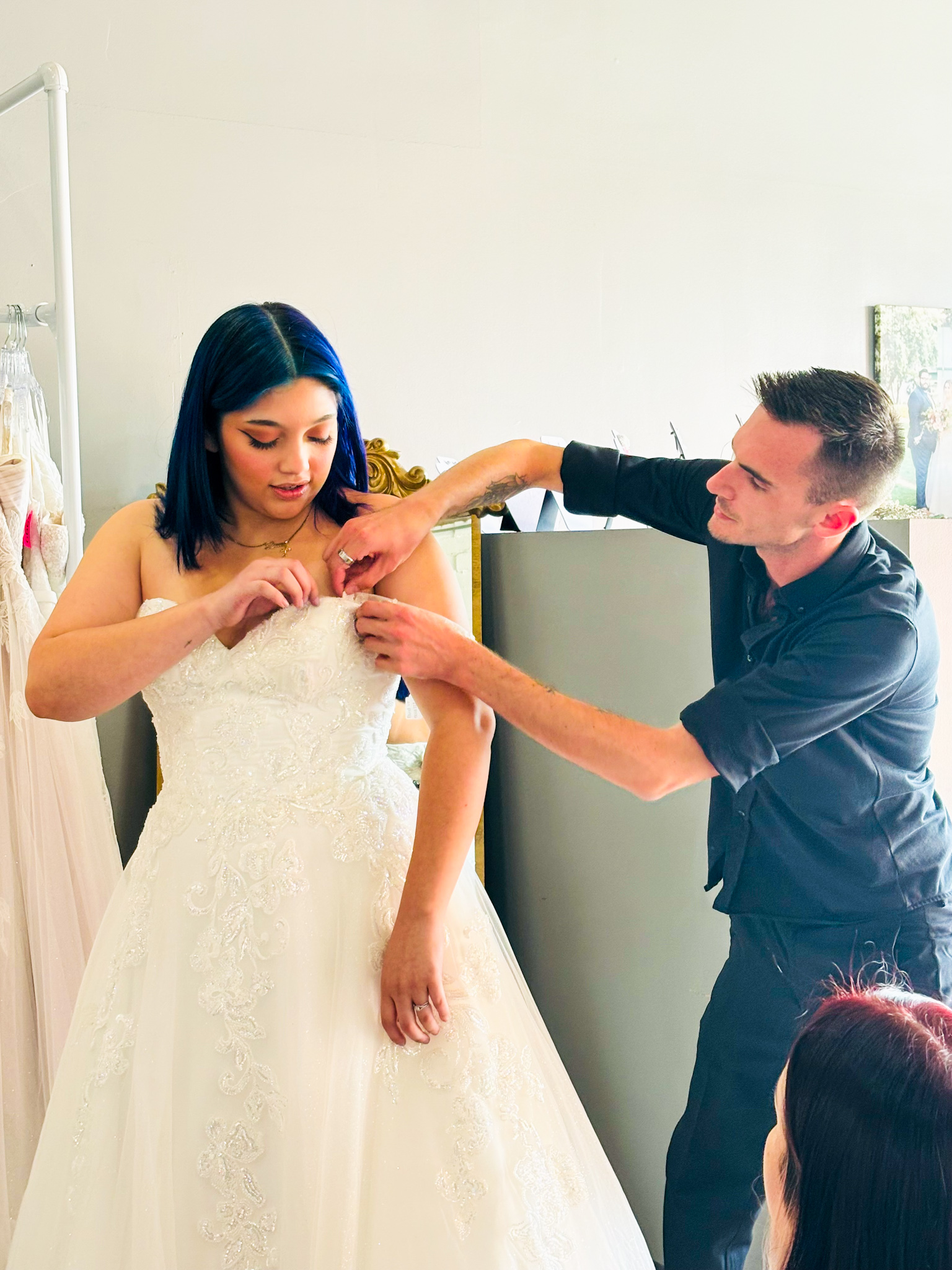 bride with bridal stylist in long beach california bridal shop