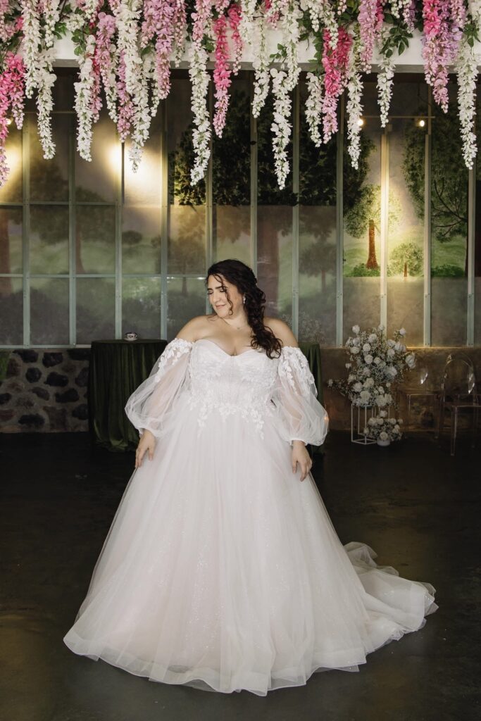 plus size bride in plus size wedding dress with sleeves los angeles california