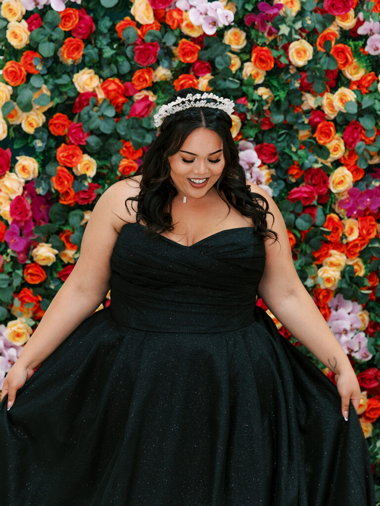 plus size bride wearing black ballgown wedding dress long beach california bridal shop