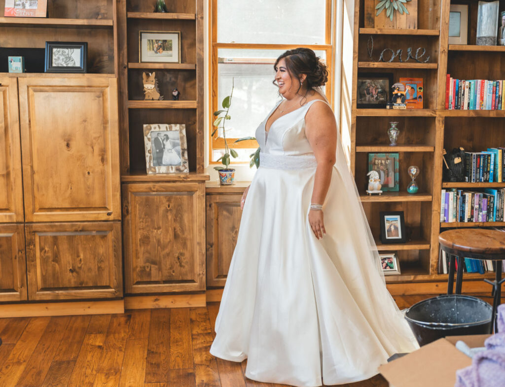 Bride wearing plus size mikado aline wedding dress in Flagstaff arizona