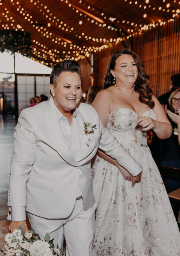 bride wearing pink wedding dress strut bridal salon
